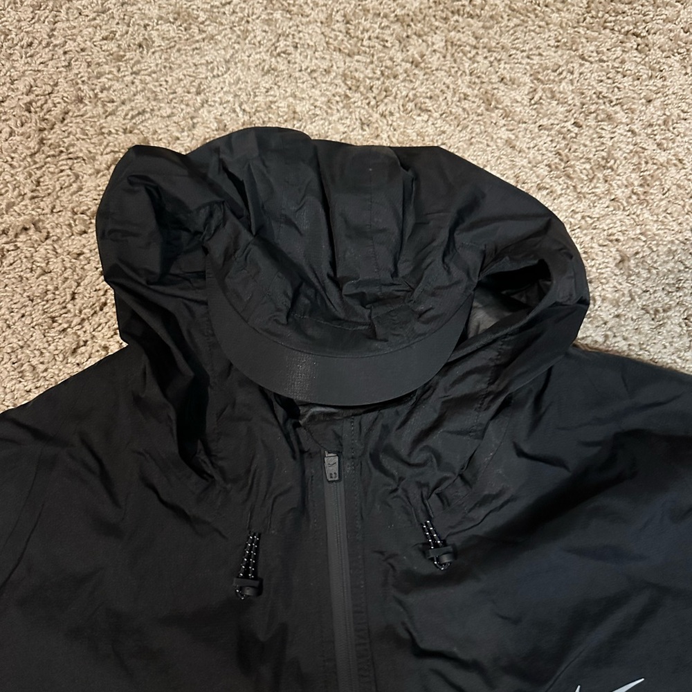 Nike Black Hooded Windbreaker with White Reflective Trim - Picture 2 of 4